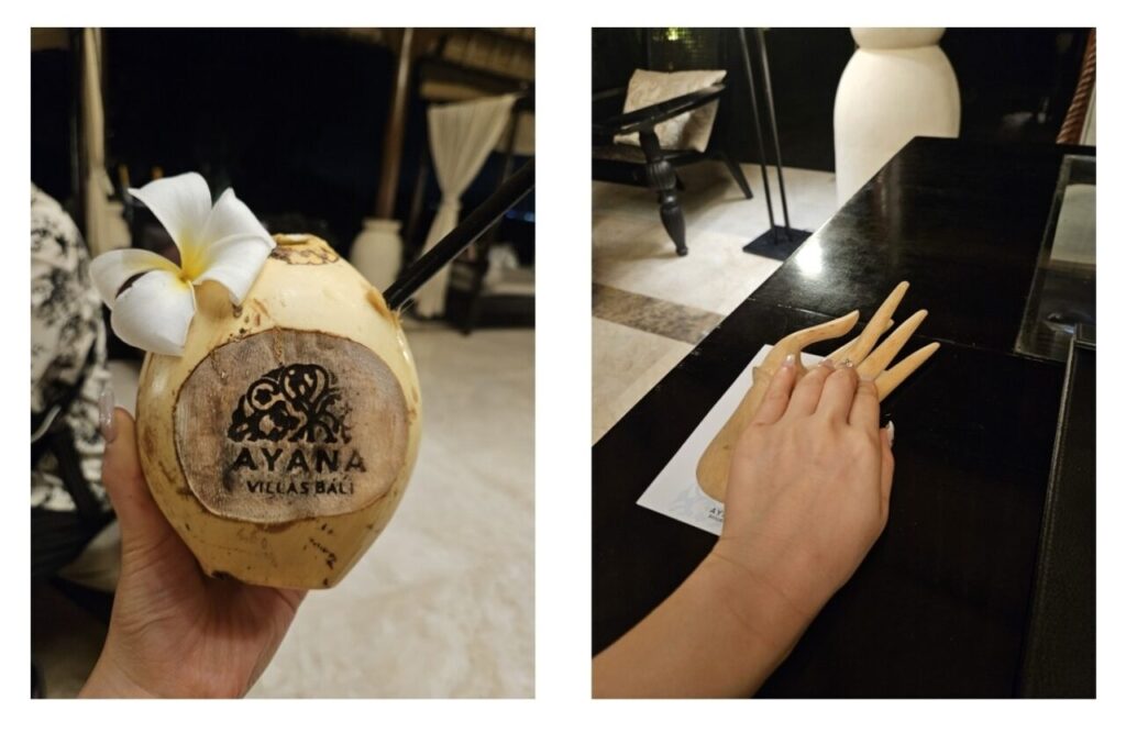 왼쪽에는 'AYANA VILLAS BALI' 로고가 새겨진 신선한 코코넛 음료와 플루메리아 꽃 장식이, 오른쪽에는 나무로 조각된 손 모형 위에 놓인 손이 보입니다.